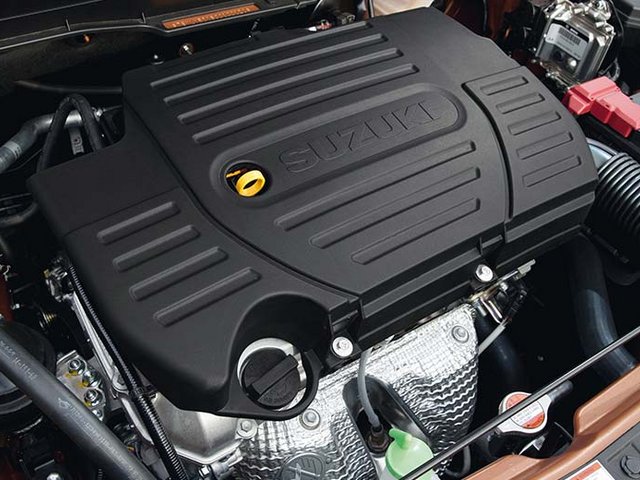 Ansicht eines Suzuki-Motors. Als carXpert-Partner bieten wir Werkstatt- und Reparatur-Services an allen Marken.